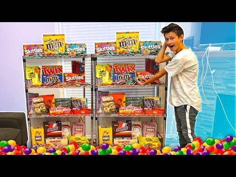 SURPRISING MY LITTLE BROTHER WITH A GIANT CANDY STORE IN MY HOUSE! ($1,000)