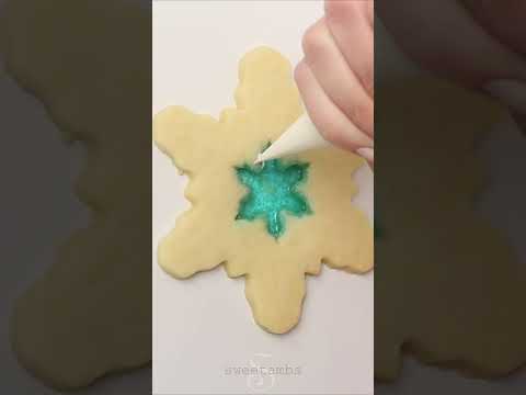 We made stained glass snowflake cookies with melted candy ❄️